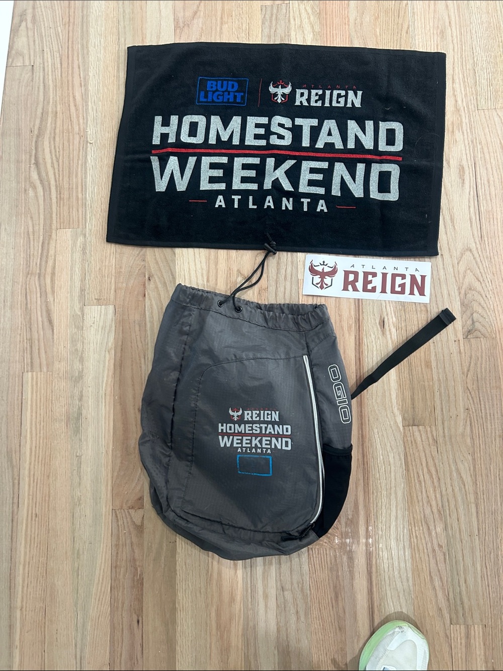 Atlanta Reign cinch bag, sticker, and towel